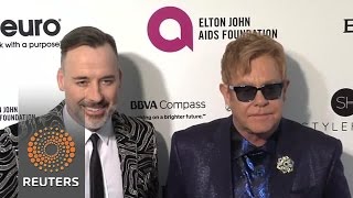 Watch Elton John hit with $exual harassment lawsuit News Video Video