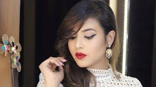 Watch HOW TO DO WINGED EYELINER AND CLASSIC RED LIP WITH A TWIST Video