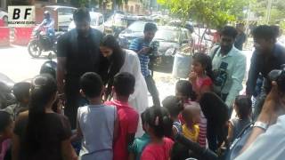 Watch Poonam Pandey Doing Social Work - Distributing Raincourt To Poor Kids - Must Watch Video