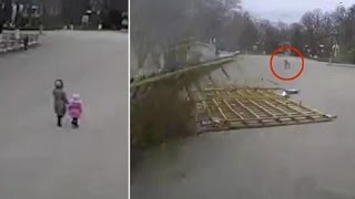 Watch Unbelievable Moment a Mother And Child Avoid Being Crushed by a Falling Building by Inches Video