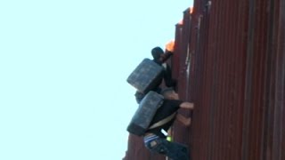 Watch Raw- Suspected Smugglers Scaling US Border Fence - News Video Video