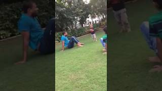 Watch Indian Cricketer Yusuf Pathan does a cartwheel as his son Aayan tries to imitate him Video