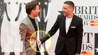 Watch BUTT GRAB: Liam Payne Grabs Louis TomlinsonÃ¢â‚¬â„¢s Junk on the Brit Awards Red Carpet Video
