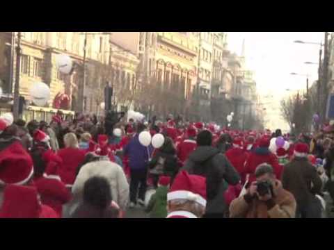 Watch Raw: 2000 Running Santas News Video Video