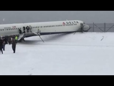 Watch Plane SKIDS off New York runway during Snow Storm News Video Video