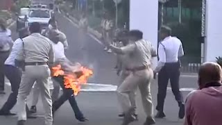 Watch Vyapam Scam- Man tries to immolate himself demanding arrest of outgoing MP Governor Video