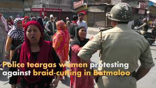Watch Police teargas women protesting against braid-cutting in Batmaloo Video