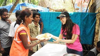 Watch Ameesha Patel Distributes Food To Poor People Outside A Temple Video