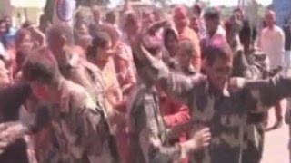 Watch BSF jawans celebrate holi at border Video