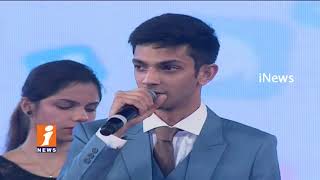 Watch Anirudh Sings PSPK25 Bayataki Vachi Chuste Song on Stage | Social Media Summit & Awards | iNews Video