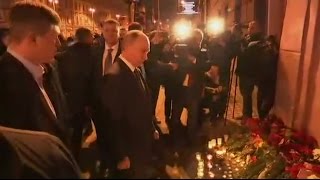 Watch Putin offers floral tribute to metro explosion victims Video