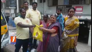Watch Paritala Ravindra Trust Distributes Food packets to Bandari Layout Colony People | iNews Video