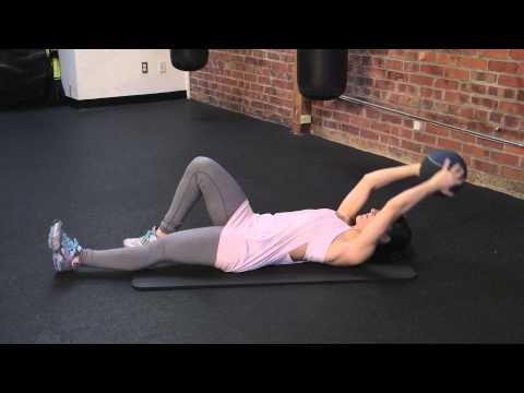 Watch How to Do a Medicine Ball Toe Touch : - Training Exercises Video