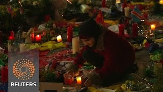 Watch Belgians mourn bombing victims at makeshift memorial News Video Video