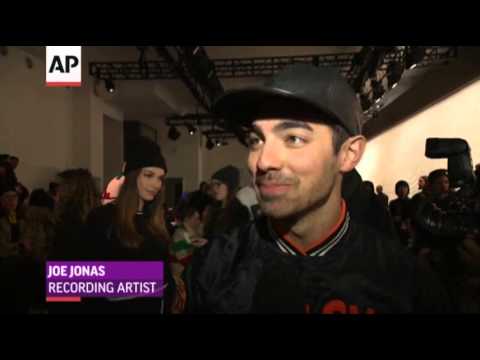 Watch Rowland Licks Chocolate Wall at Fashion Show News Video Video