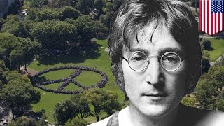 Watch John Lennon's 75th birthday celebrated by world record human peace sign attempt Video