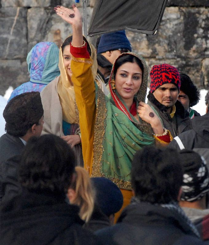 Download Tabu waves during the shooting of her film Haider in Anantnag. Wallpaper HD FREE