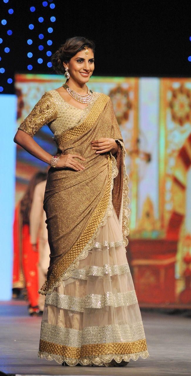 Download Parizad Kolah displays a creation by designer Vikram Phadnis at Shaina NC's fashion show held in aid of cancer patients.  Wallpaper HD FREE